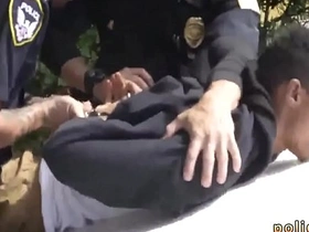 Asian police officers in uniform having gay sex with a suspect on the run
