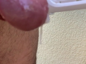 Young Asian man masturbates in solo scene.